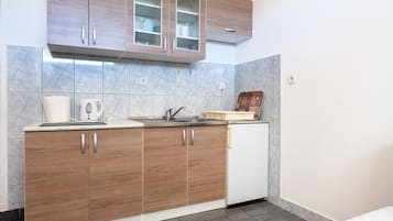 Fridge, stovetop, cookware/dishes/utensils
