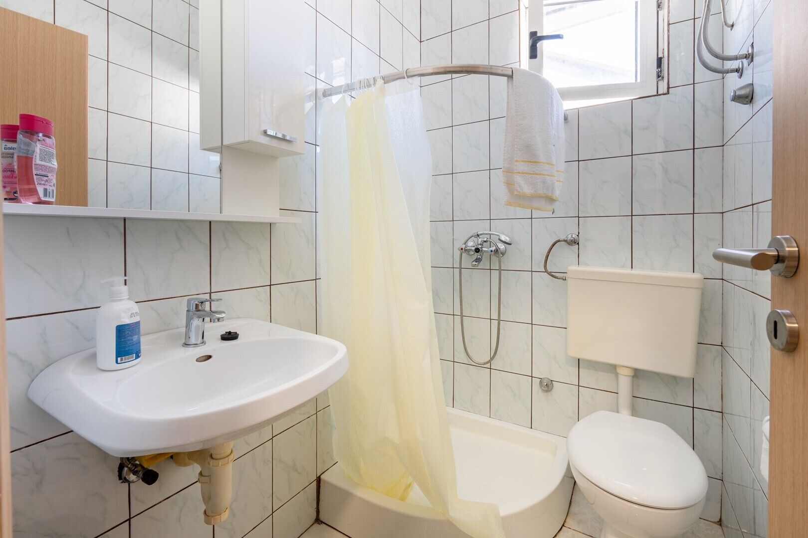 Een douche, handdoeken