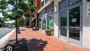 A sidewalk with a brick pavement, a bench, and a tree. - Full apartment, 7 minutes from dulles airport (Herndon)