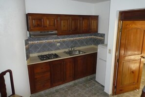 Private kitchen - Residencial Estephany- Comfortable Apartment with Pool (Sosúa)