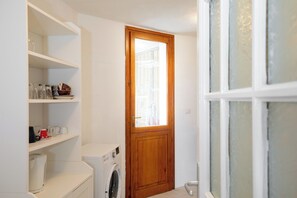 Apartment, 2 Bedrooms, Partial Sea View | Laundry - La Terrazza alla Buca 18 by Wonderful Italy (Arzachena)