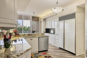 Fridge, microwave, oven, stovetop - Grand Bay 3 BR / 3 BA Condo on LBK by FVC (Longboat Key)