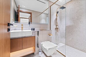 Departamento Confort, cocina, vista a la ciudad | Baño