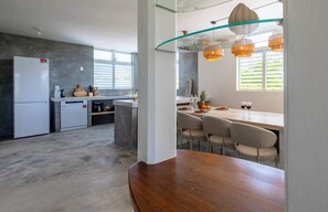 Fridge, stovetop, dishwasher, coffee/tea maker