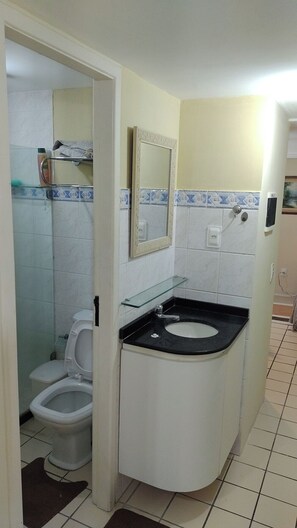 Shower, towels, toilet paper