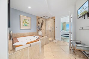 Jetted tub, hair dryer, towels, soap