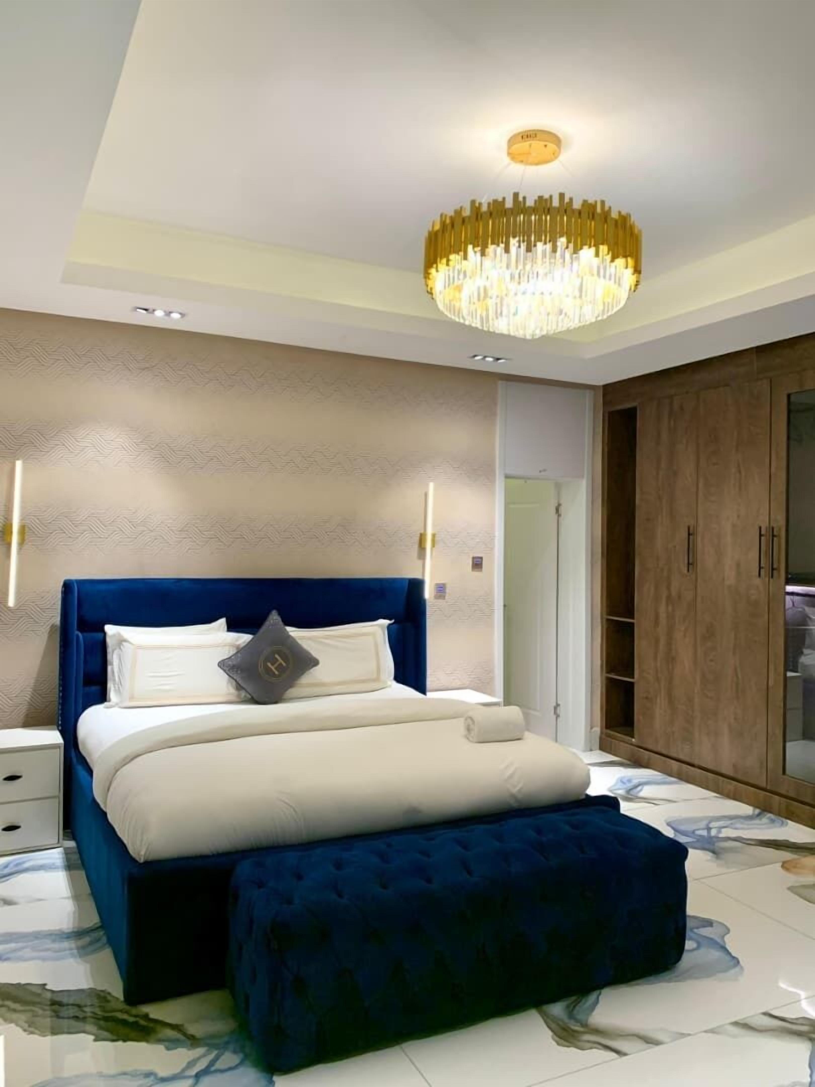 Luxury Apartment, Pool View | In-room safe, desk, laptop workspace, blackout drapes