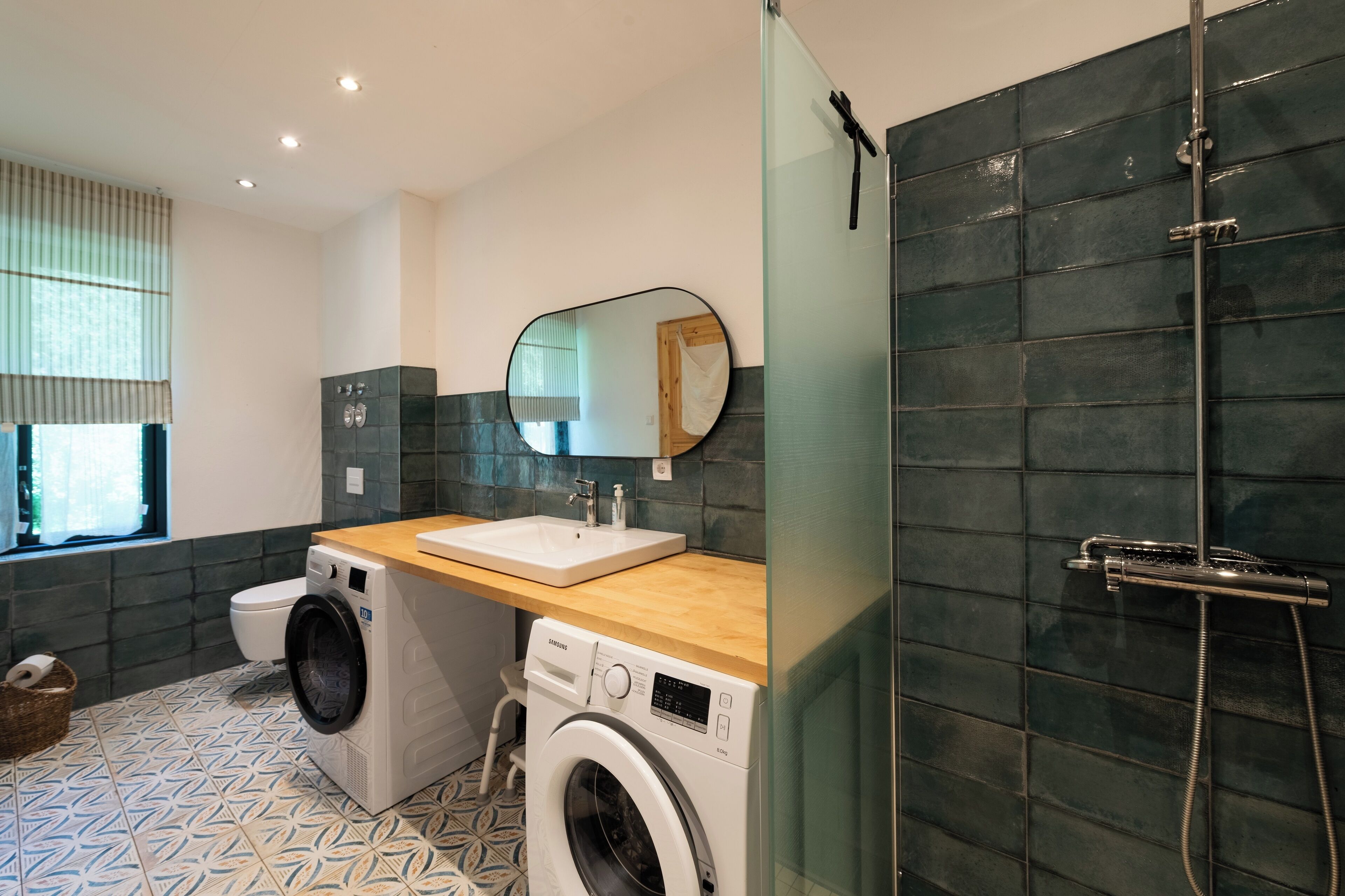 Shower, hair dryer, towels, toilet paper