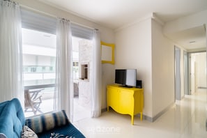 Basic Apartment | Living area | 32-inch Smart TV with digital channels