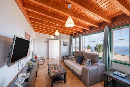 Living area. Holiday Home 'Los Duraznos' with Private Terrace, Private Garden and Wi-Fi