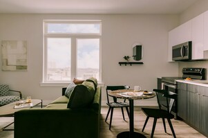 Apartment, 1 Queen Bed with Sofa bed | Living area | Smart TV