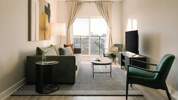 LĂ€genhet Deluxe - 1 sovrum - balkong - utsikt mot staden | Vardagsrum | Smart-tv