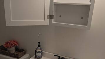 Hair dryer, towels, soap, toilet paper