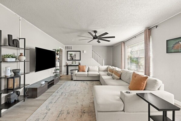 TV, fireplace - Big Value Retreat • Spacious 3BR + Backyard (Oklahoma City)