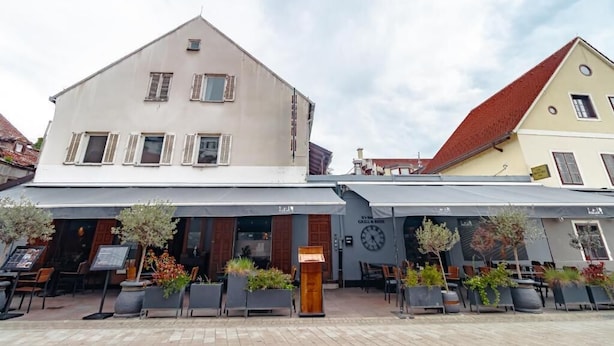 A building with a cafe and outdoor seating area. - The Vlasta Collection (Zagreb)