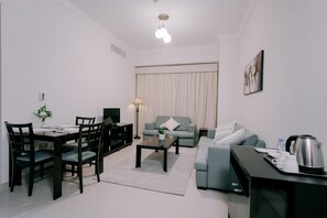 Apartment, 1 Bedroom | Living area | 32-inch Smart TV with satellite channels - Alraya Homes by Betu  (Abu Dhabi)