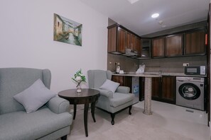 Deluxe Studio | Desk, laptop workspace, soundproofing, iron/ironing board - Alraya Homes by Betu  (Abu Dhabi)