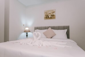 Apartment, 1 Bedroom | Desk, laptop workspace, soundproofing, iron/ironing board - Alraya Homes by Betu  (Abu Dhabi)
