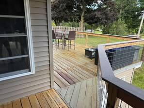 Outdoor dining - 4-bedroom house on the Black River in Fort Gratiot. Dock your boat out back! (Fort Gratiot)