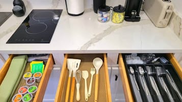Fridge, microwave, stovetop, coffee/tea maker