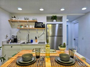 Fridge, microwave, stovetop, coffee/tea maker