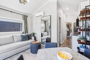 Cottage, 2 Bedrooms, Patio | Living room | Flat-screen TV - North Fork Cottages & RV Resort (Greenport)