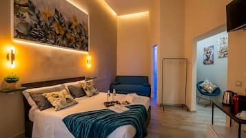 Triple Room, Private Bathroom | Free minibar, in-room safe, blackout drapes, soundproofing