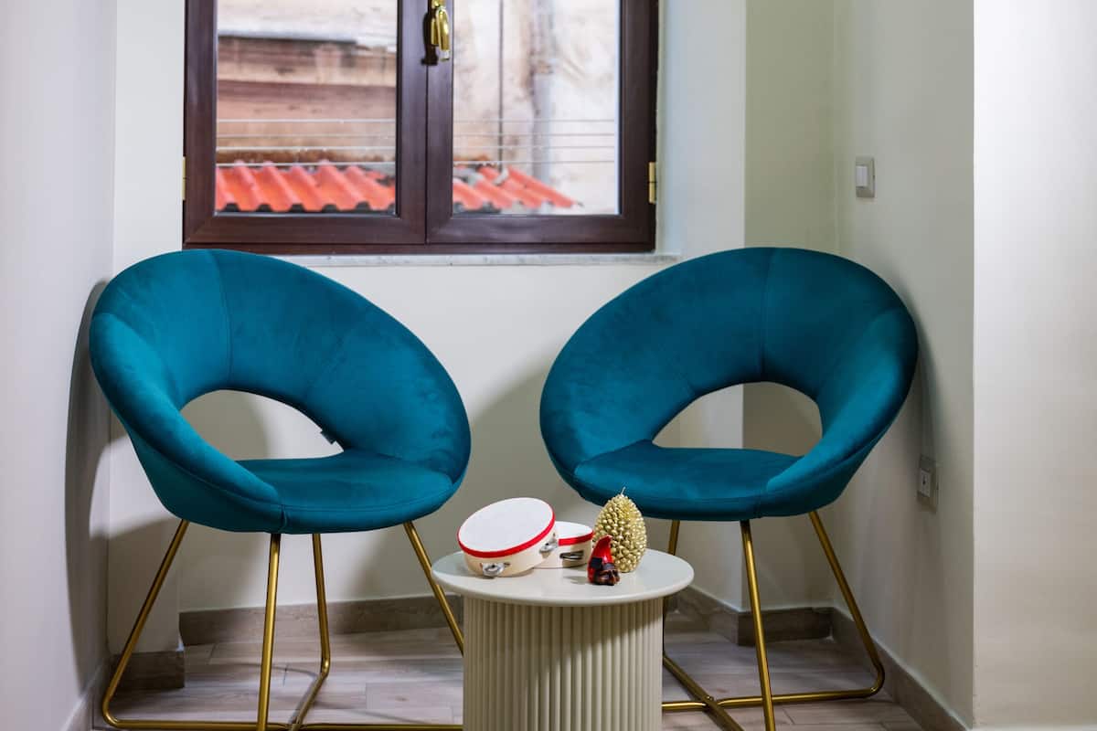 Triple Room, Private Bathroom | Free minibar, in-room safe, blackout drapes, soundproofing