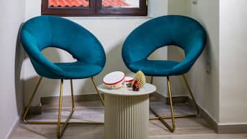 Triple Room, Private Bathroom | Free minibar, in-room safe, blackout drapes, soundproofing