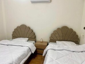 3 chambres, fer et planche à repasser, Wi-Fi, draps fournis