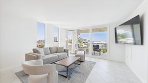 TV, fireplace - The Nest @ Holiday Isle with Private Beach Access, Pool and Pickleball (Destin)