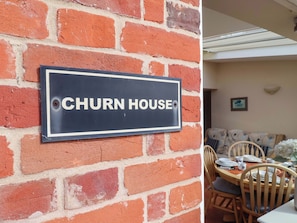A brick wall with a sign that reads "CHURN HOUSE". - Churn House (Ipswich)
