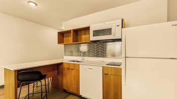 Suite, 1 King Bed, Non Smoking | Private kitchen