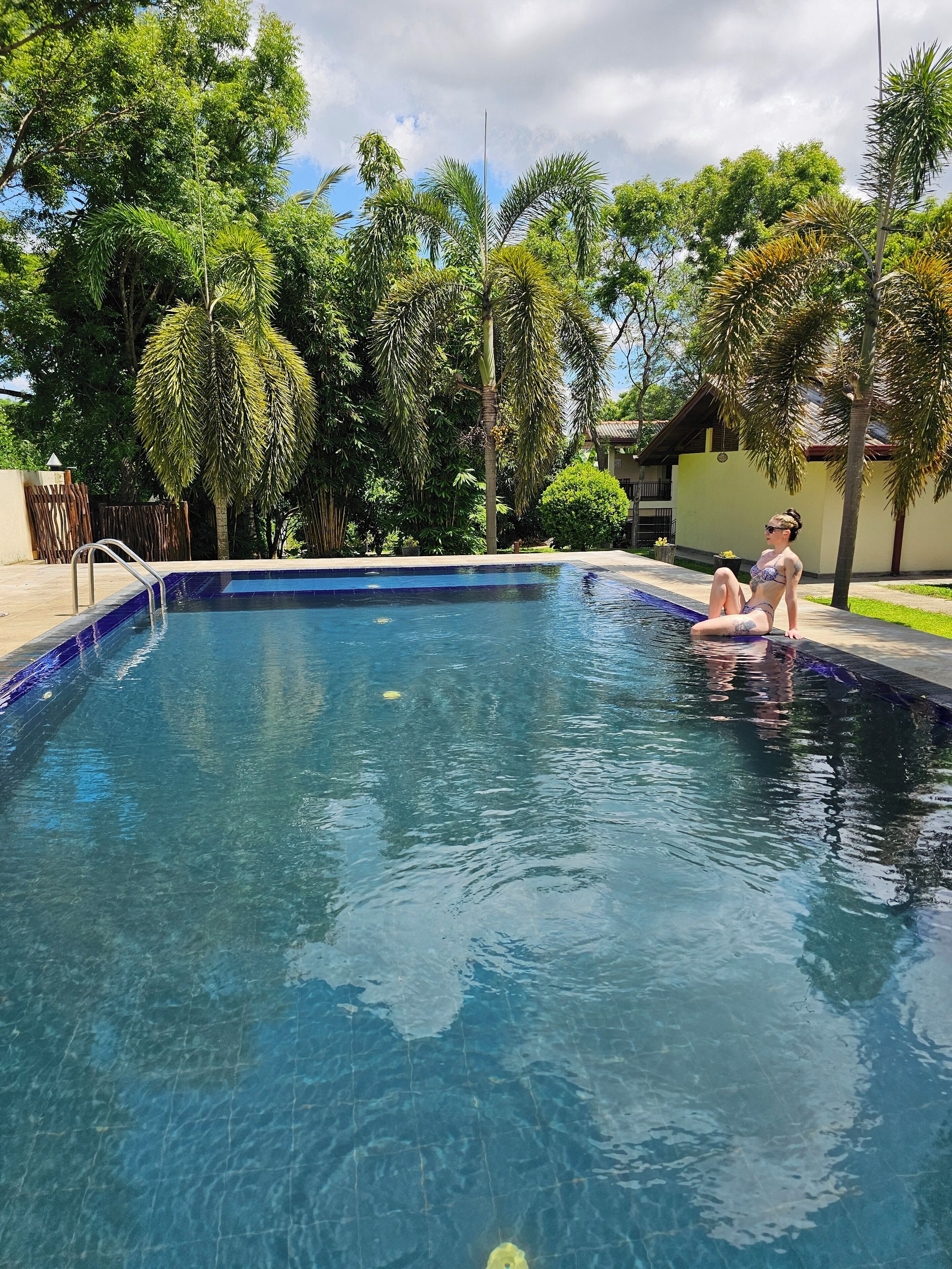 Outdoor pool, pool umbrellas, pool loungers