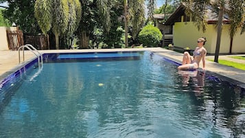Outdoor pool, pool umbrellas, pool loungers