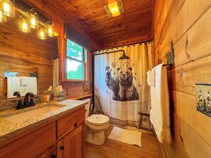 Shower, hair dryer, towels, shampoo