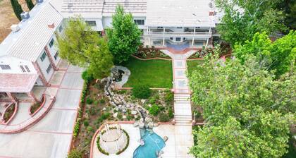 The Grand Estate nestled along the serene banks of the Kern River