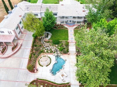 The Grand Estate nestled along the serene banks of the Kern River