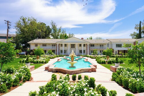 The Grand Estate nestled along the serene banks of the Kern River