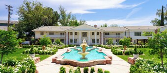 The Grand Estate nestled along the serene banks of the Kern River