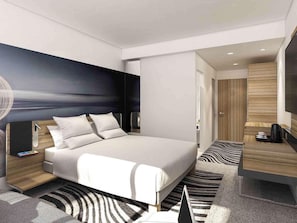 A modern hotel room with a large bed, bedside tables, a desk, and a flat-screen TV. - Novotel Paris Coeur D'orly (Orly)