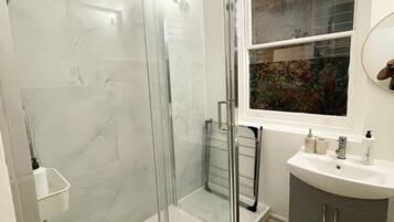 Hair dryer, towels, soap, toilet paper