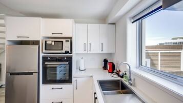 Fridge, microwave, dishwasher, coffee/tea maker