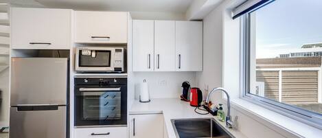 Fridge, microwave, dishwasher, coffee/tea maker