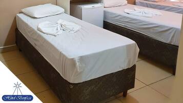 Quarto triplo, várias camas | Wi-Fi de cortesia