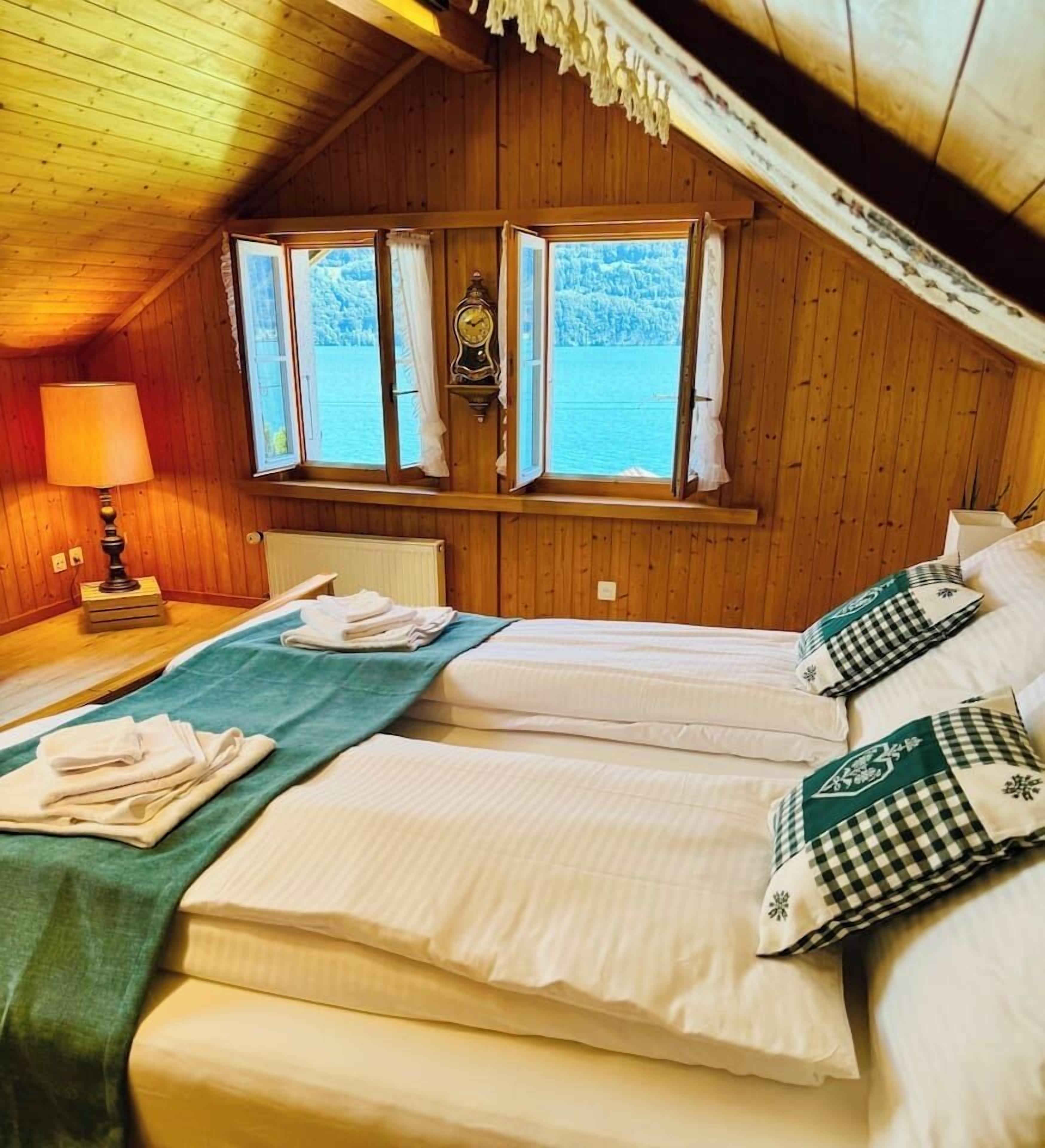 Wake up to breathtaking lake views from the master bedroom