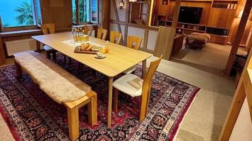 Dining together in a cozy chalet setting
