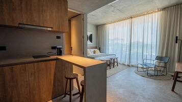 Superior Double Room, Balcony | Living area