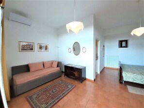 Quadruple Room, Courtyard View | Blackout drapes, free WiFi, bed sheets - Borgo Floreani (Vendoglio-Carvacco)