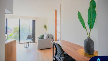 Family Apartment, City View | Living area | LED TV